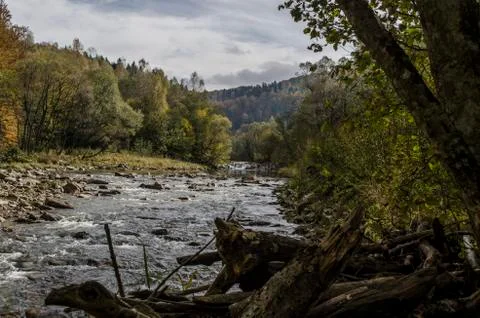 River in the sun and clouds Stock Photos