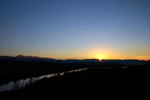 The river by sunset Stock Photos