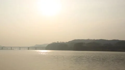 River at sunset reflection with mountain Stock-Footage 303031514