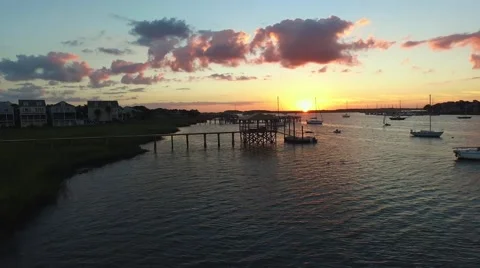 River Sunset with silhouetted yachts Video stock 56877284