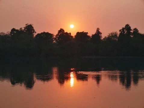 River sunset sun reflection Stock Photos