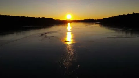 The river in the sunset. Sunset over the lake. A beautiful sunset. Stock Footage 233819586