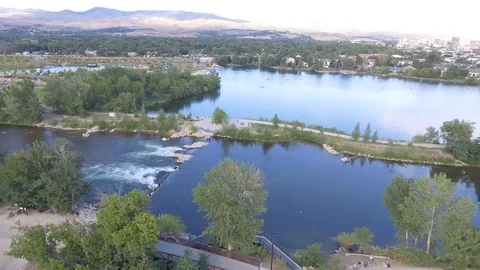 River Surf Spot Aerial Pull Back Stock Footage 100090171