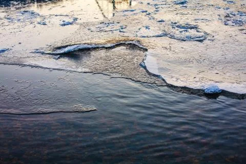 River surface covered with melting ice Stock Photos