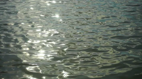 River surface with small ripples  at sunset Stock Footage 35754166