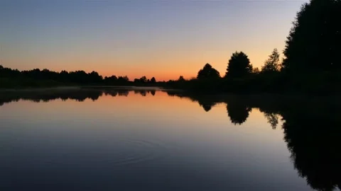 River surface at sunset Stock Footage 137595517