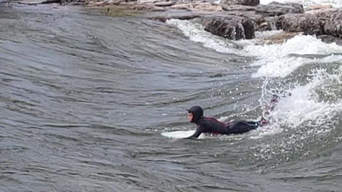 River Surfer Making A Backwards Surf Attempt At Brennan's Wave Montana Stock Footage 339974137
