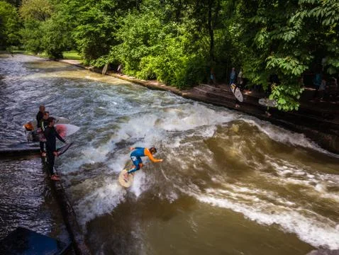 River surfing Munich Stock Photos