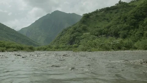 River surrounded by beautiful mountains in Colombia Stock Footage 153811028