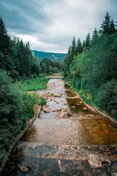 A river surrounded by mountains 스톡 사진