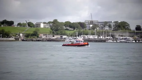 River Tamar Cornwall England. Small tug on the river Stock Footage 134566893