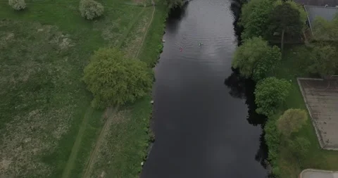 The River Tees from above by drone showing 2 canoeist on the River Stock Footage 131082774