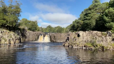 The River Tees at Low Force waterfalls in Autumn, County Durham, England, UK Video stock 285178096