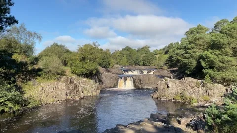 The River Tees at Low Force waterfalls in Autumn, County Durham, England, UK Vídeo Stock 285178289