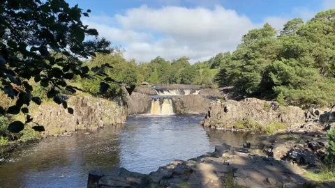 The River Tees at Low Force waterfalls in Autumn, County Durham, England, UK Stock Footage 285178347