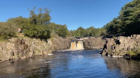 The River Tees at Low Force waterfalls in Autumn, County Durham, England, UK Stock Footage 285179555
