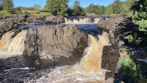 The River Tees at Low Force waterfalls in Autumn, County Durham, England, UK Vídeo Stock 285179558