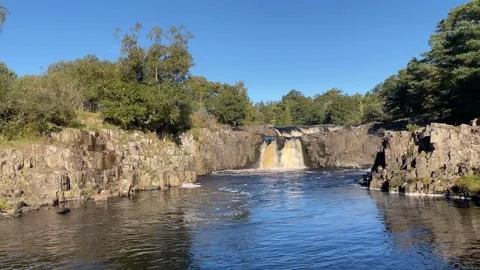 The River Tees at Low Force waterfalls in Autumn, County Durham, England, UK Stock Footage 285179640