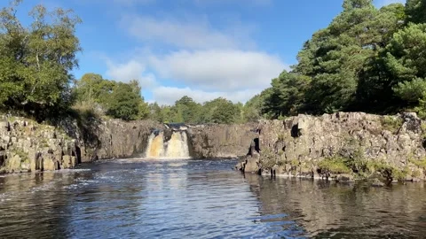 The River Tees at Low Force waterfalls in early Autumn, England, UK Stock Footage 287475857