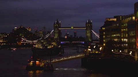 The River Thames and Tower Bridge at dusk illuminated Video stock 82802480