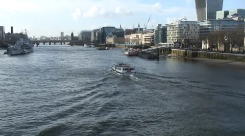 River Thames with boats including HMS Belfast 02 Stock Footage 35596348