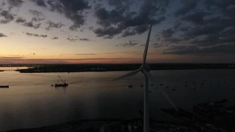River Thames evening flyover with Wind Turbine Part 1 Stock Footage 116468050