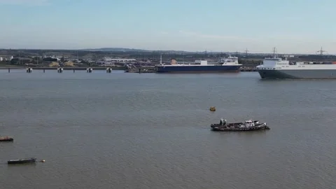 River thames freight traffic viewed from Gravesend Kent Stock Footage 249539762