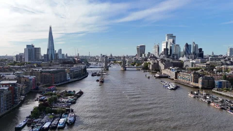 River Thames Tower Bridge and City Skyline Aerial Stock Footage 346638428