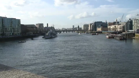 The River Thames from Tower Bridge including HMS Belfast, and London Bridge 01 Video stock 35596550