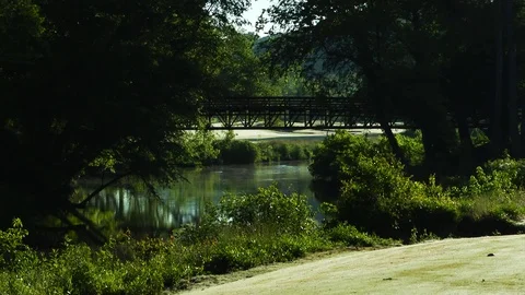 River Through Golf Course Stock Footage 69775993