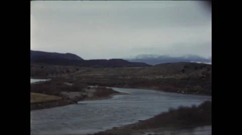 River Through Mountain Valley Video stock 47663312