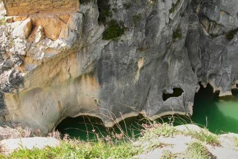 River through steep mountains Stock Photos
