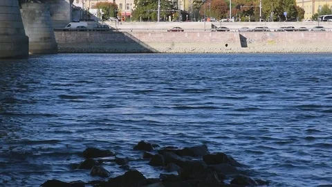 River with traffic in the background timelapse Stock Footage 70452914