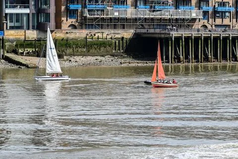 River traffic by tower Bridge on River Thames Stock Photos