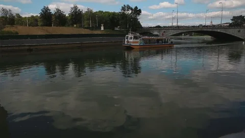 The river tram is sailing along the river Stock Footage 79523810