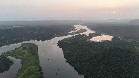 River with tributary in sunset from the sky - 2 Stock Photos