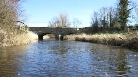 River trip canoe boat reflections water 4k adventure holidaysstone bridge Stock Footage 49625634