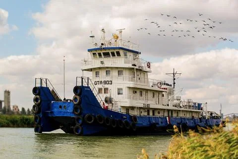 River tug in the background of the river Stock Photos