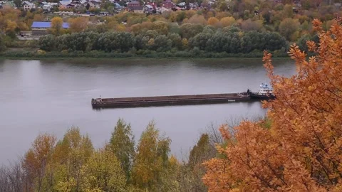 River tug with a barge. River channel for freight transportation, top view. Stock Footage 165066399