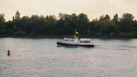 River tug sails past a red buoy. Stock Footage 107031655