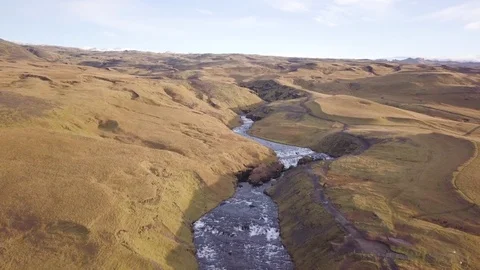 River turns into powerful waterfall, shot from a drone Stock Footage 91244984