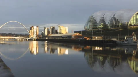 River Tyne in low evening sunlight, Millenium Bridge, Sage &amp; Baltic Arts Stock Footage 1102185