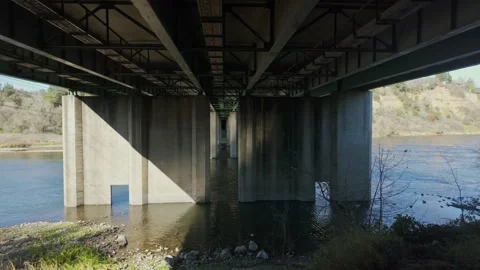 River under bridge 60fps winter Stock Footage 297703612