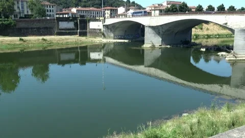 A river under a bridge, Italy Stock Footage 133119590
