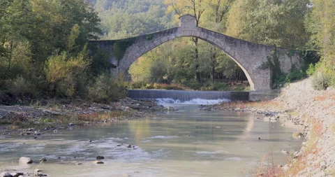 River under the old bridge Stock Footage 220429326
