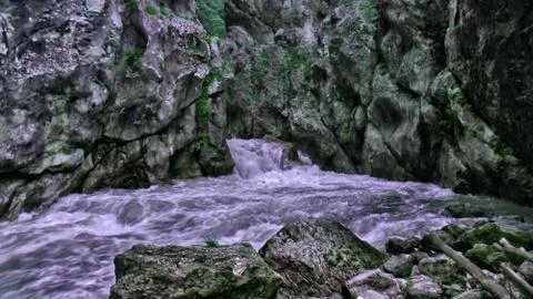 The river from under the rocks Stock Photos
