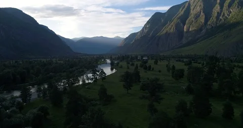 River in a valley among mountains Stock Footage 108028320