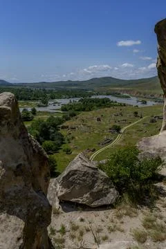 River valley landscape viewed between sandstone cliffs Stock Photos