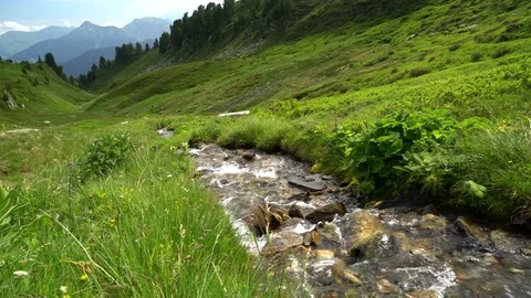 River in valley at mountain Stock Footage 84854194