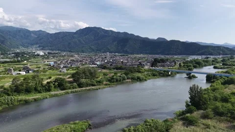 River Valley Townscape and Bridge in Nagano Japan Stock Footage 336625490